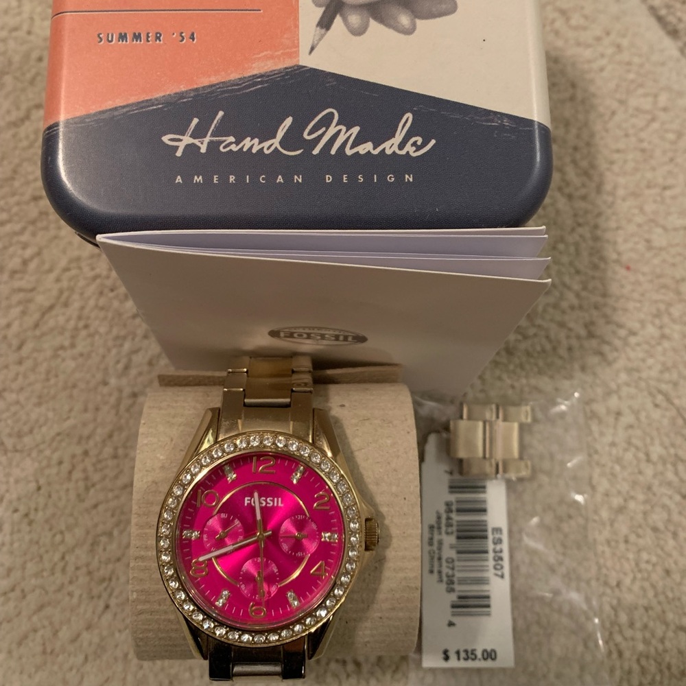 Pink and gold fossil women’s watch with box